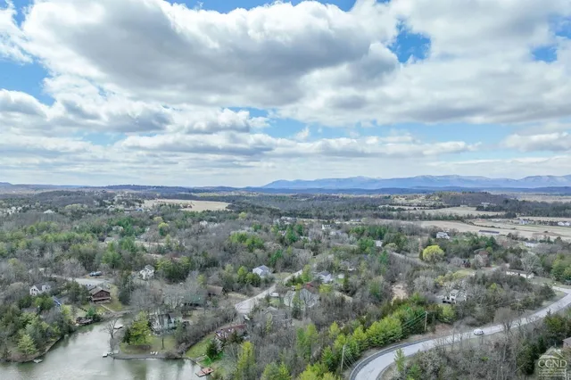 a view of a yard with lake view