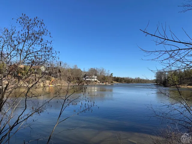 a view of a backyard of the house