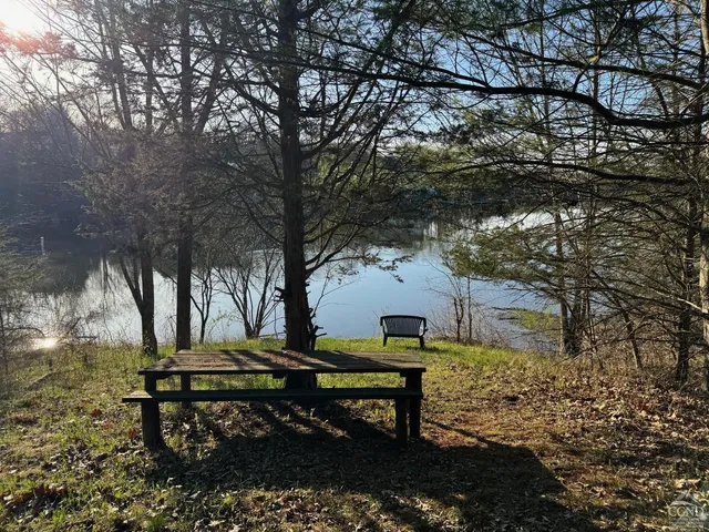 a view of lake with mountain