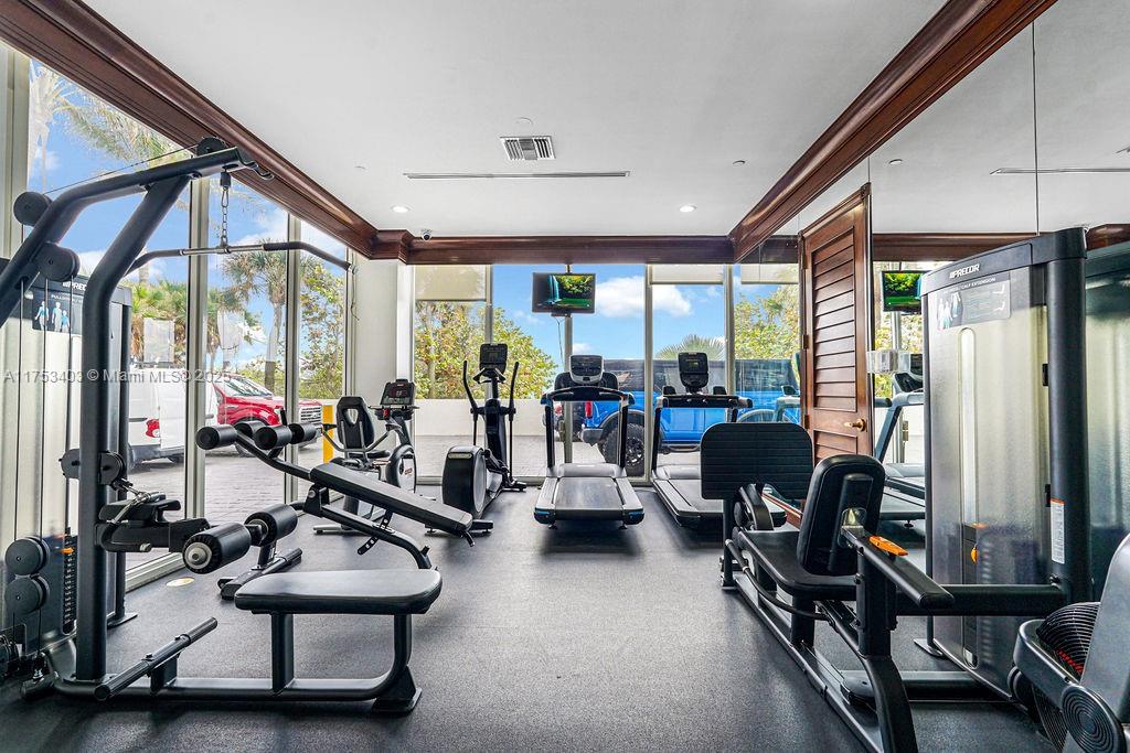 8925 Collins Avenue, Unit 2E Surfside, FL 33154 - Photo 41 of 46 a view of a room with gym equipment