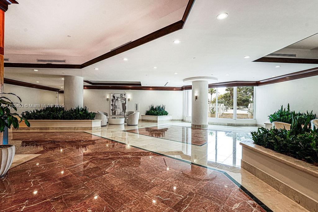 8925 Collins Avenue, Unit 2E Surfside, FL 33154 - Photo 45 of 46 a view of a living room and kitchen