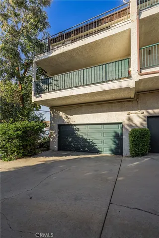 a view of a building with a street