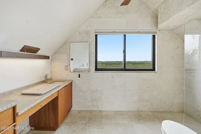 a view of a backyard of the house