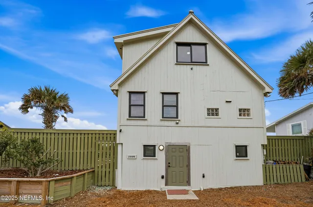 a view of a balcony with wooden floor and stairs