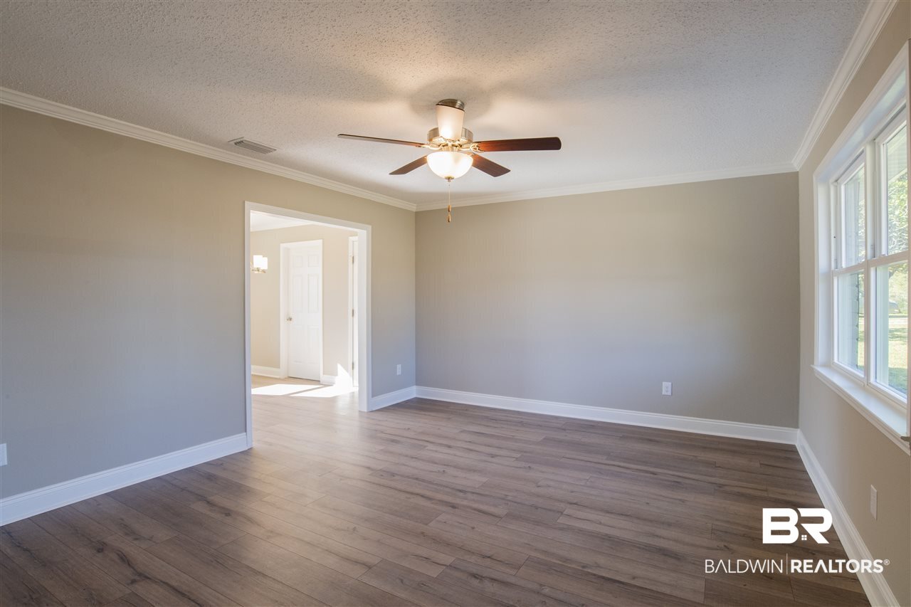9141 Semmes Court Semmes, AL 36575 - Photo 5 of 28 Large room for entertaining.