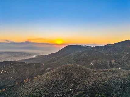 a view of ocean and mountain