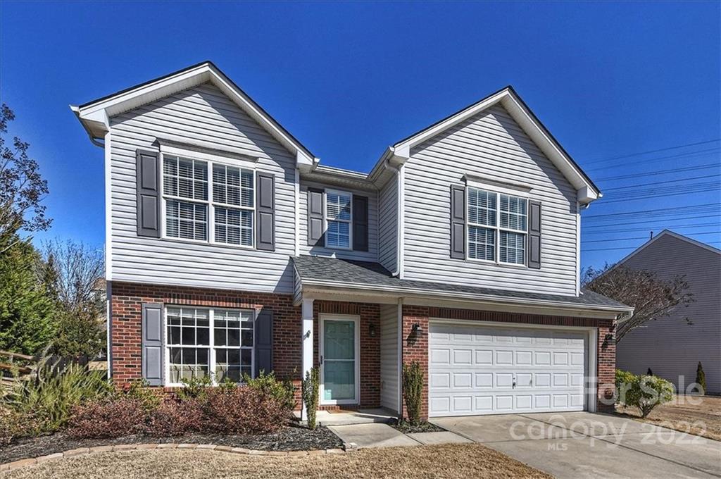 7671 Black Hawk Lane Tega Cay, SC 29708 - Photo 2 of 45 a front view of residential houses