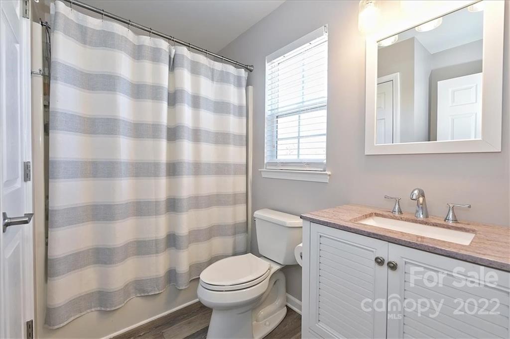 7671 Black Hawk Lane Tega Cay, SC 29708 - Photo 31 of 45 a bathroom with a sink toilet and shower