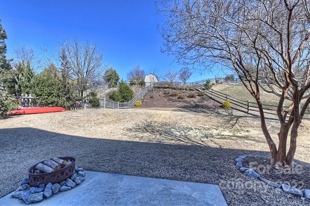 7671 Black Hawk Lane Tega Cay, SC 29708 - Photo 39 of 45 a view of a yard with an outdoor space