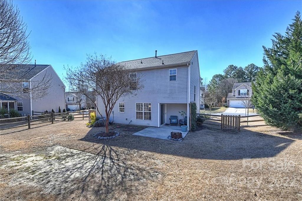 7671 Black Hawk Lane Tega Cay, SC 29708 - Photo 45 of 45 a view of a house with a yard