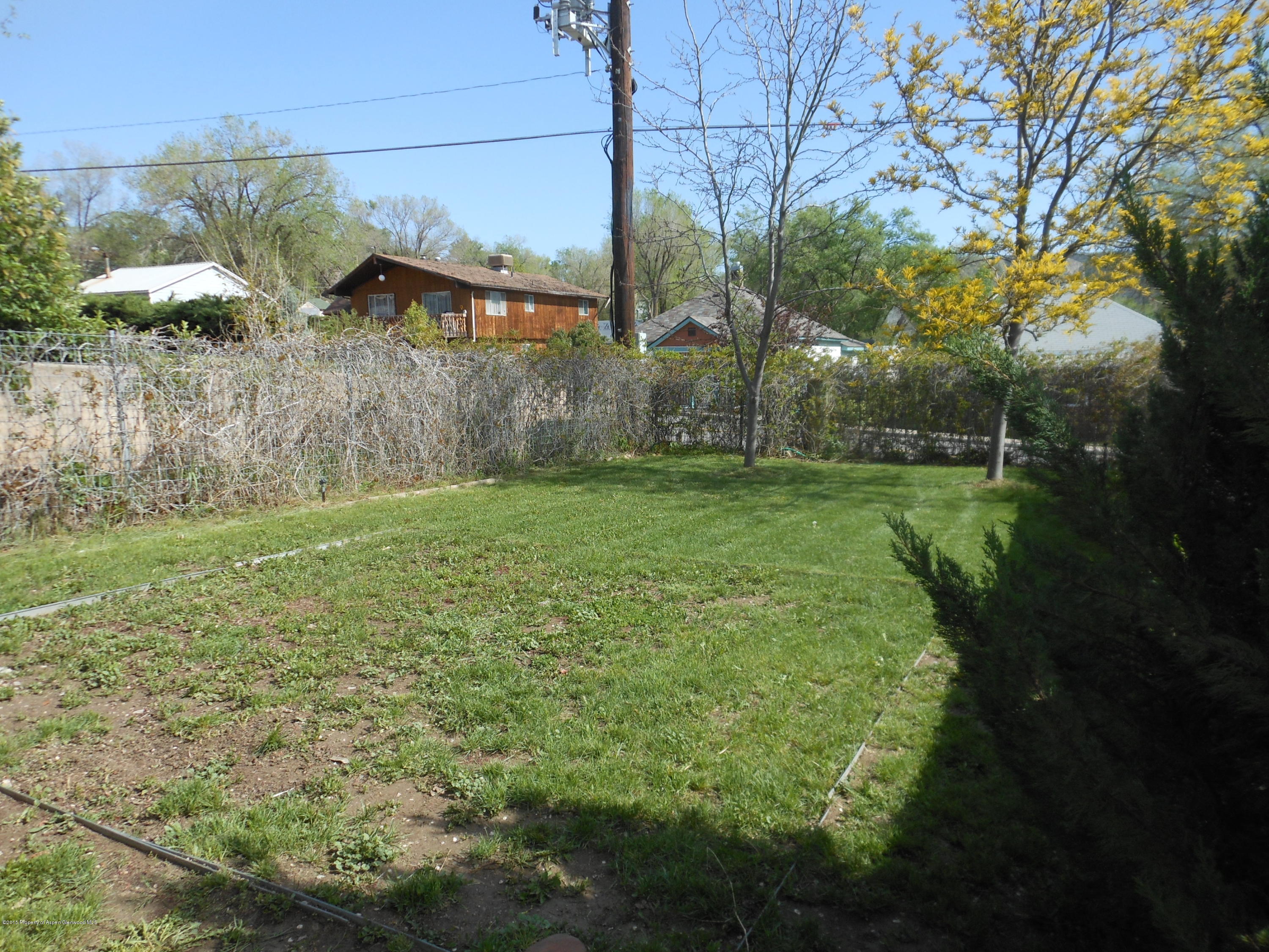 300 East 7th Street Rifle, CO 81650 - Photo 21 of 24 a view of a backyard