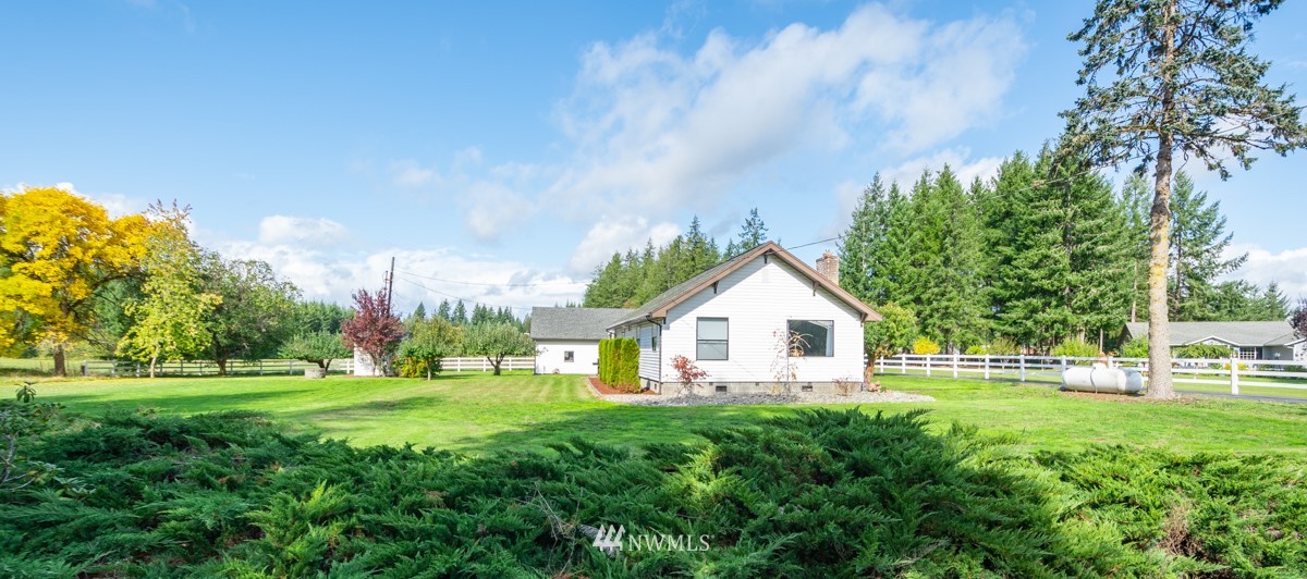 1311 Koontz Road Chehalis, WA 98532 - Photo 2 of 16 a view of a house with yard and sitting area