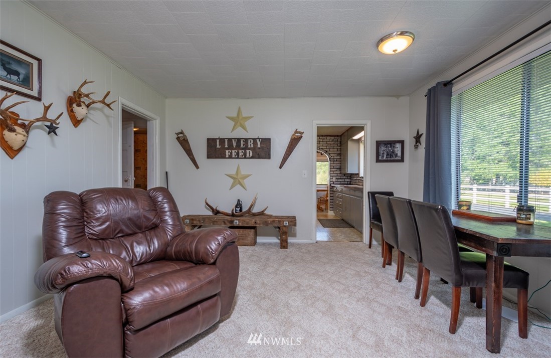 1311 Koontz Road Chehalis, WA 98532 - Photo 11 of 16 a living room with furniture and a window