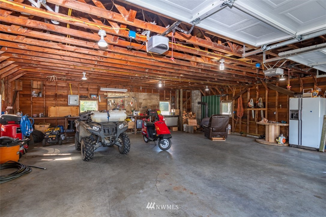 1311 Koontz Road Chehalis, WA 98532 - Photo 5 of 16 a view of a garage with a table and chairs