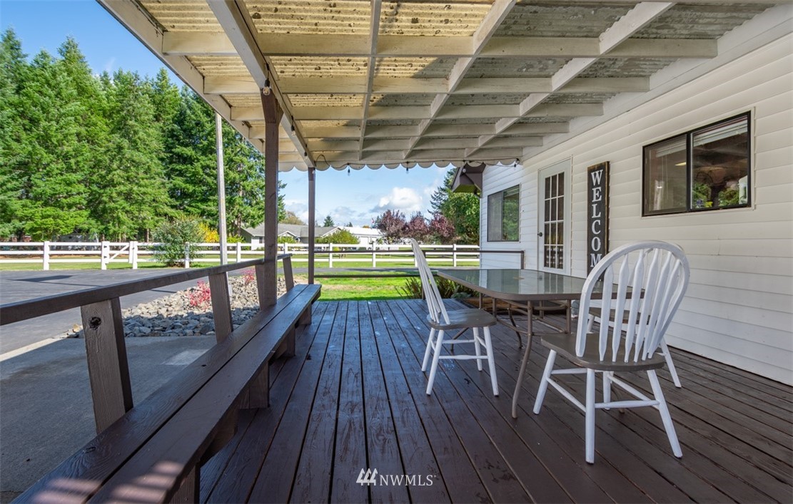 1311 Koontz Road Chehalis, WA 98532 - Photo 7 of 16 a view of a chairs and table on the balcony