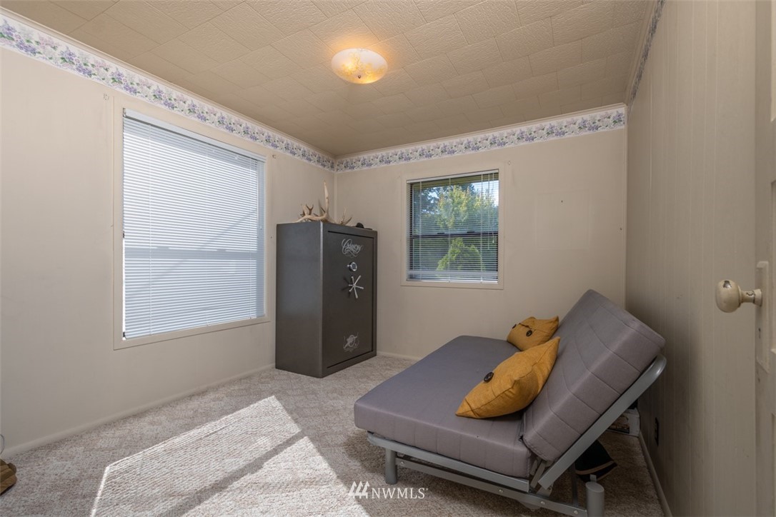 1311 Koontz Road Chehalis, WA 98532 - Photo 8 of 16 a living room with furniture and a window