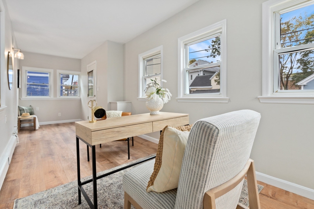 50 Shawmut Street Lawrence, MA 01841 - Photo 19 of 38 a living room with furniture and window