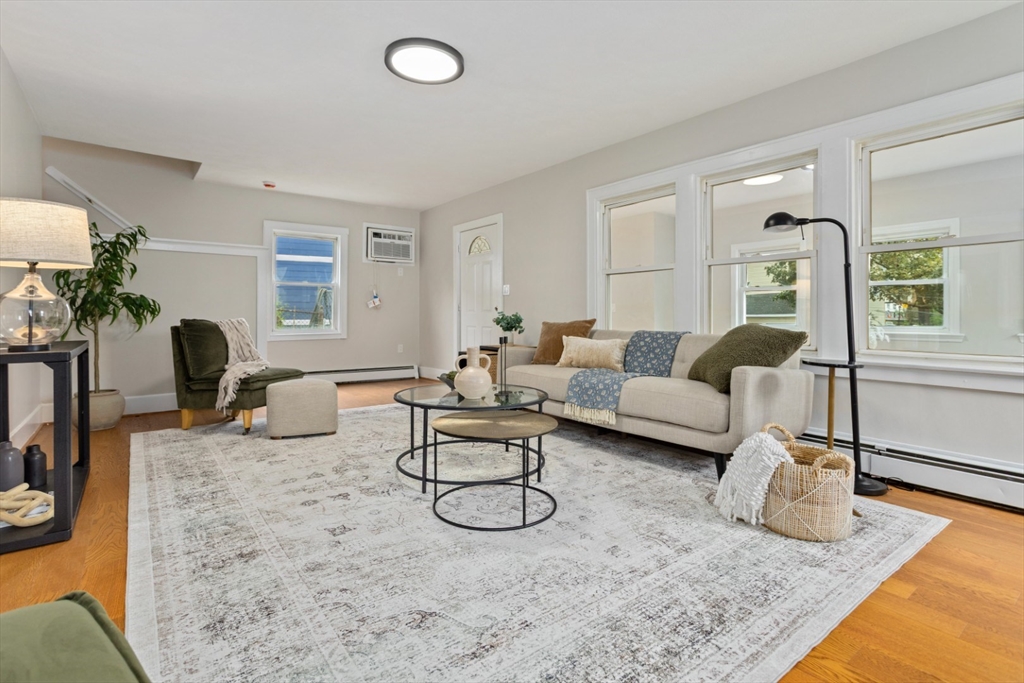 50 Shawmut Street Lawrence, MA 01841 - Photo 6 of 38 a living room with furniture rug and window