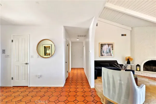 a kitchen with stainless steel appliances granite countertop sink stove and large window