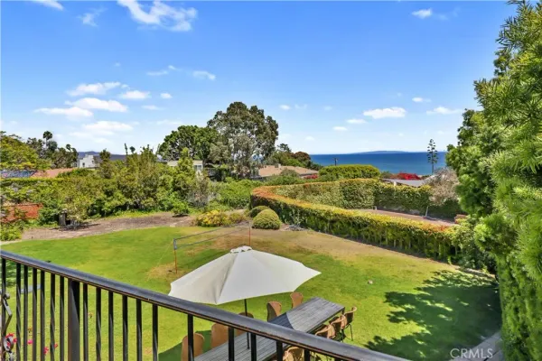 a view of a lake with a big yard