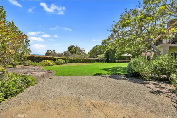 a view of a swimming pool with an outdoor seating