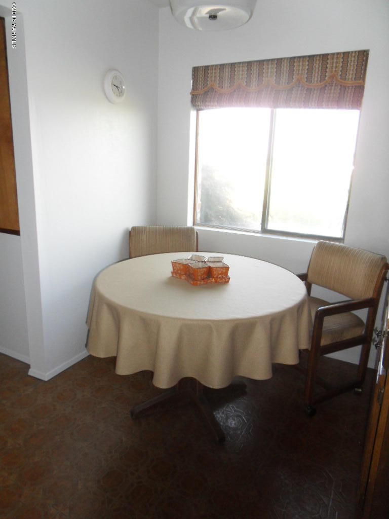 1601 Dilley Road Tieton, WA 98947 - Photo 14 of 18 a dining room with a table and chairs