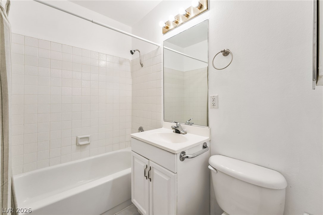 242 Nebraska Avenue Henderson, NV 89015 - Photo 23 of 46 Full bath featuring vanity and shower combination