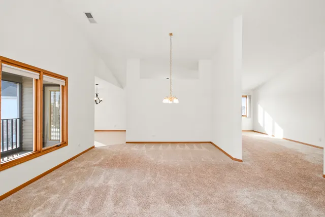 a view of a room with a large window