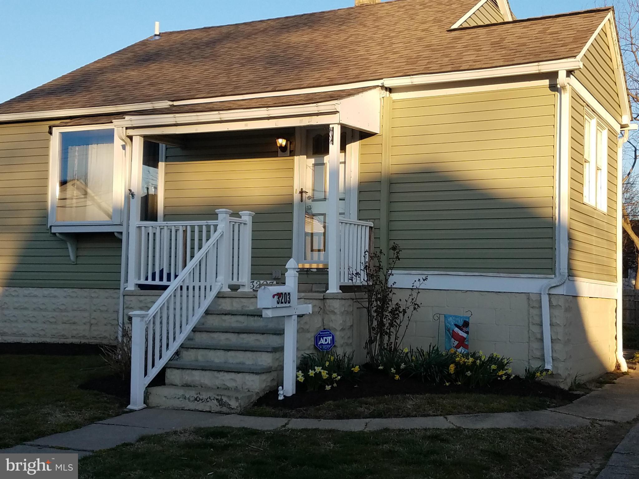 3203 River Drive Road Baltimore, MD 21219 - Photo 2 of 18 a view of a house with backyard and garden