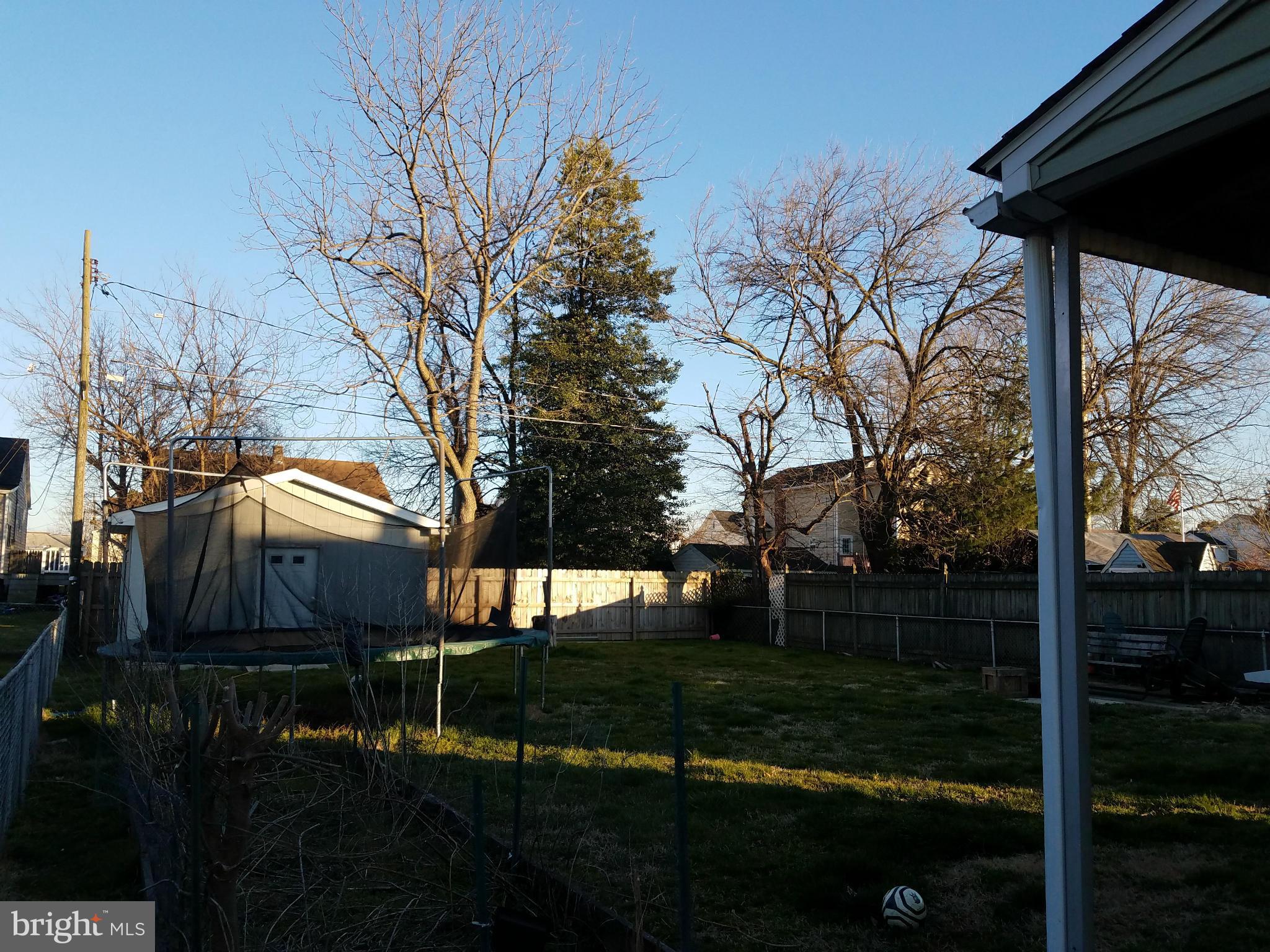 3203 River Drive Road Baltimore, MD 21219 - Photo 14 of 18 a view of house with backyard and garden