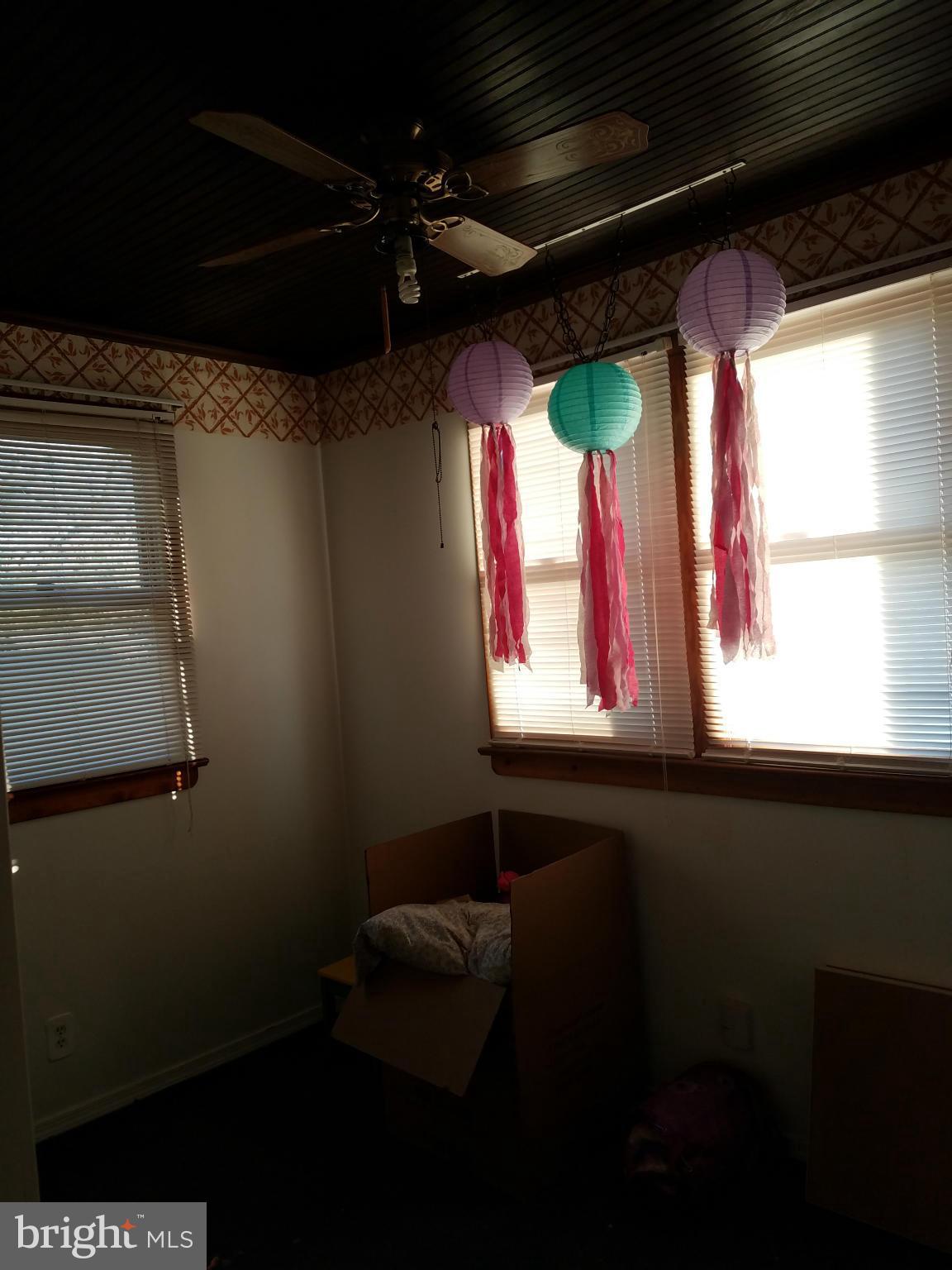 3203 River Drive Road Baltimore, MD 21219 - Photo 8 of 18 a room with window and outdoor view