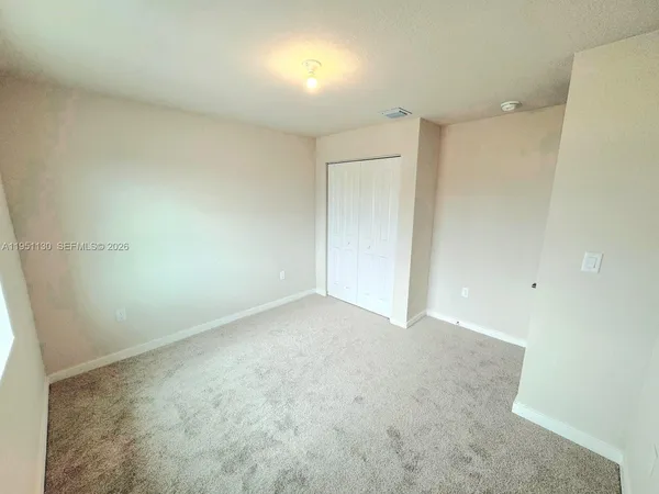 an empty room with a natural light