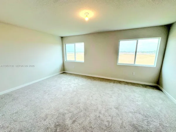 an empty room with a window