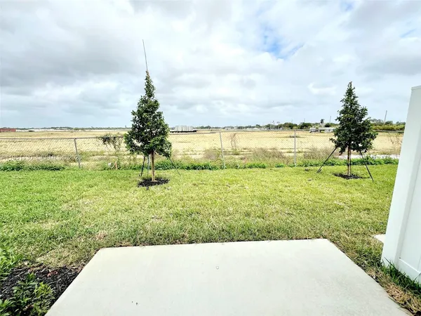 a view of a garden and lake