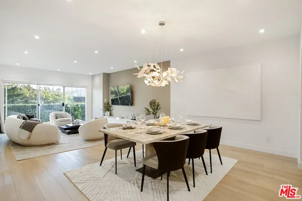 a kitchen with granite countertop a stove and cabinets