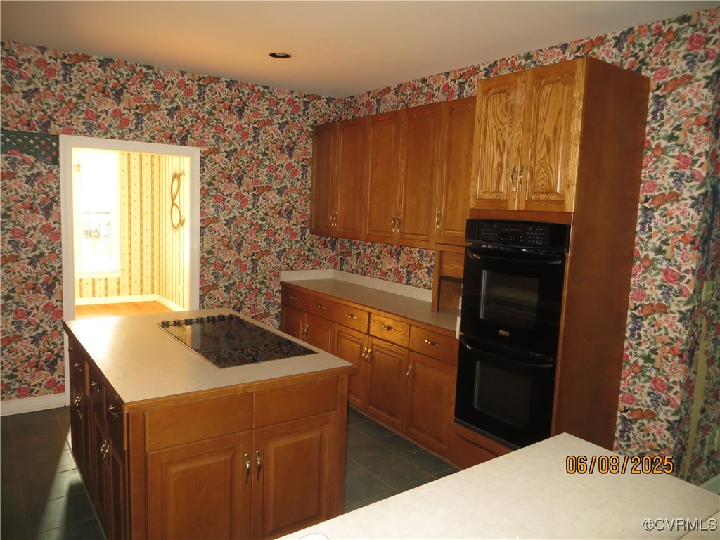 9630 Beaver Bridge Road Chesterfield, VA 23838 - Photo 3 of 18 a kitchen that has a sink and a stove in it