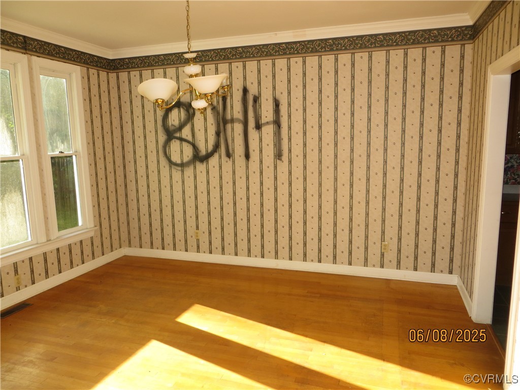 9630 Beaver Bridge Road Chesterfield, VA 23838 - Photo 8 of 18 a view of a door with a potted plant on a wall