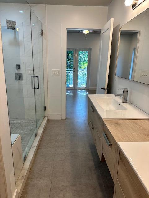 8 Bowen Drive Key Largo, FL 33037 - Photo 20 of 22 a spacious bathroom with a granite countertop sink mirror and shower