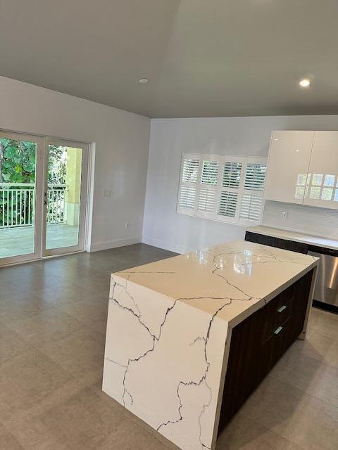 8 Bowen Drive Key Largo, FL 33037 - Photo 7 of 22 a bed sitting in a spacious bedroom next to a window