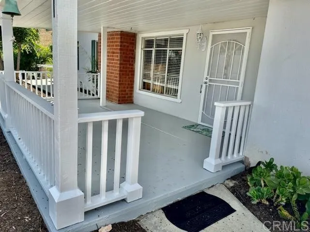 a house view with a garden space