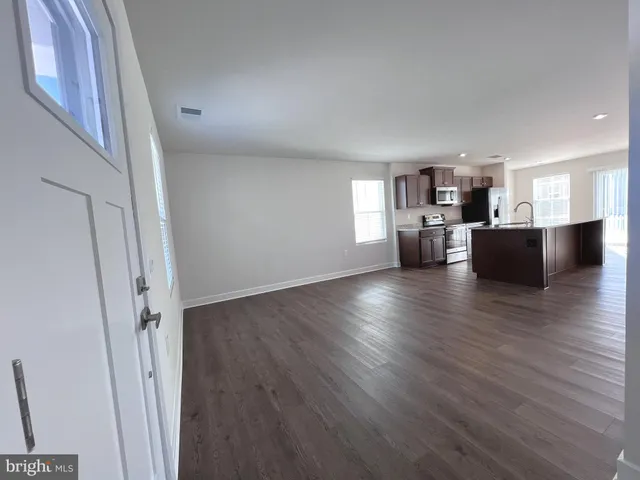 a view of kitchen and dining room