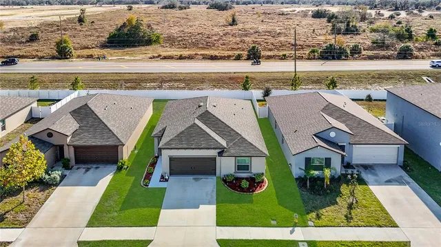 an aerial view of a house with garden