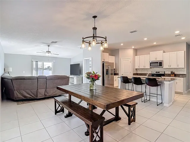 a view of a dining room with furniture