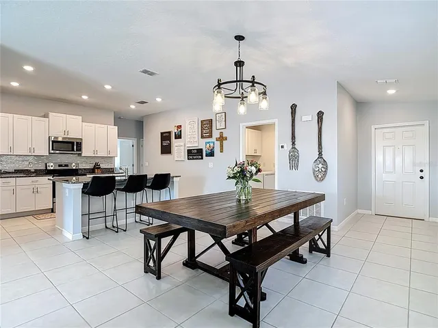 a view of a dining room with furniture
