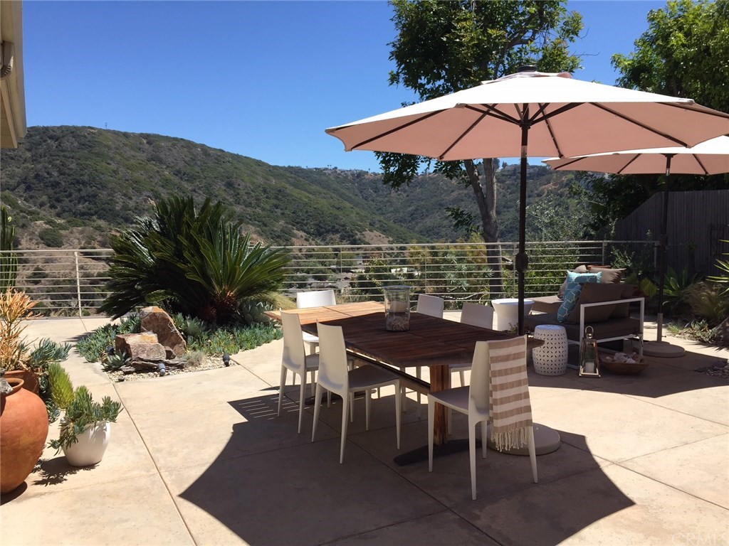 1450 Morningside Drive Laguna Beach, CA 92651 - Photo 13 of 33 Flat 800 sf rear patio with lovely hillside views
