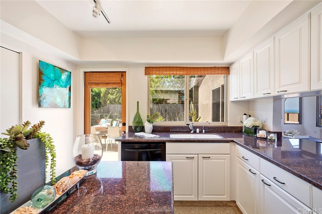 1450 Morningside Drive Laguna Beach, CA 92651 - Photo 20 of 33 Access to rear patio from Light & Bright Kitchen