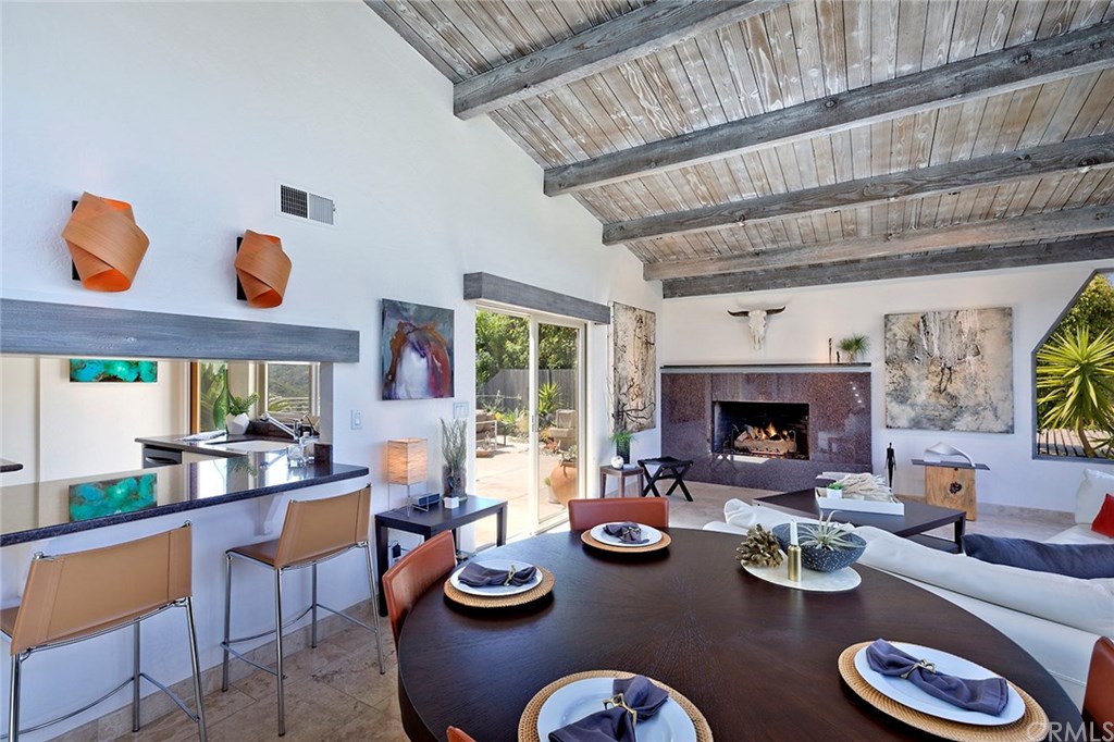 1450 Morningside Drive Laguna Beach, CA 92651 - Photo 10 of 33 Dining area with counter through to kitchen