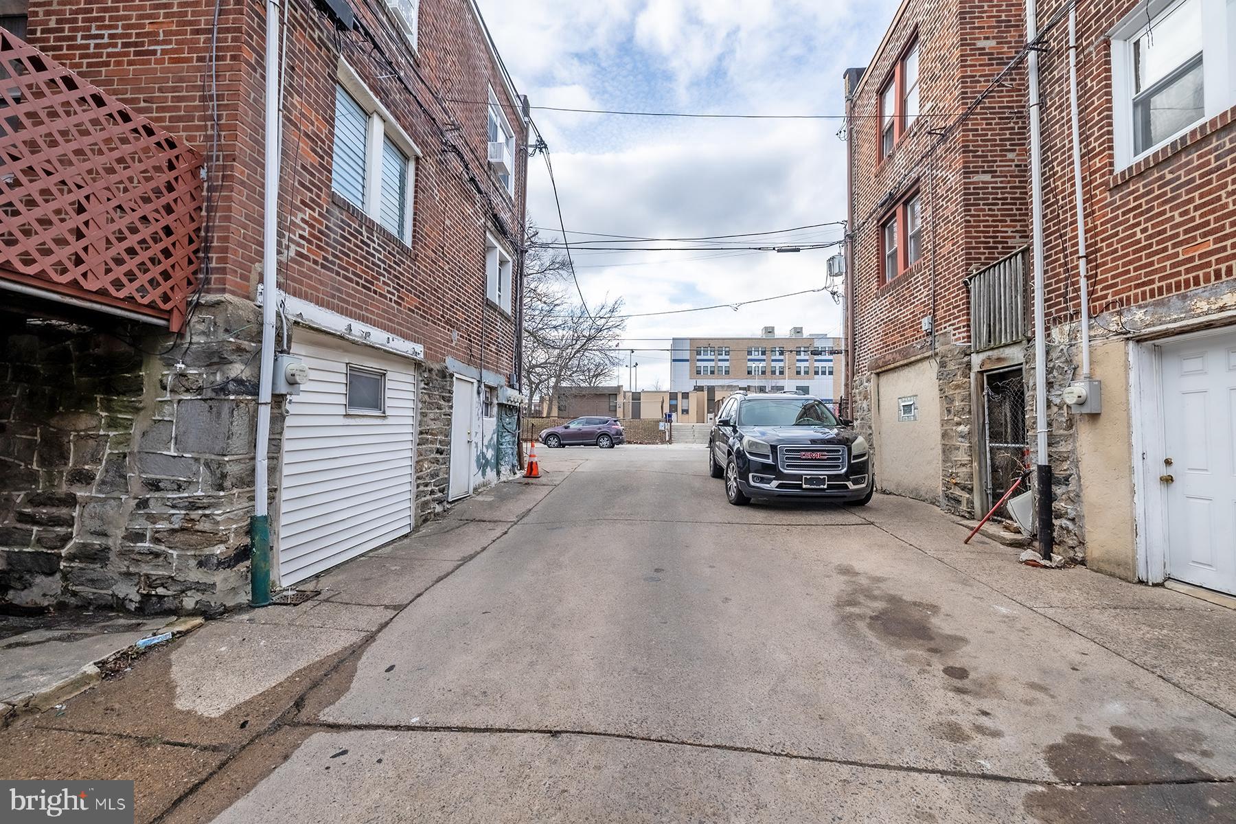 3104 Stirling Street Philadelphia, PA 19149 - Photo 25 of 27 a view of a city street with tall buildings