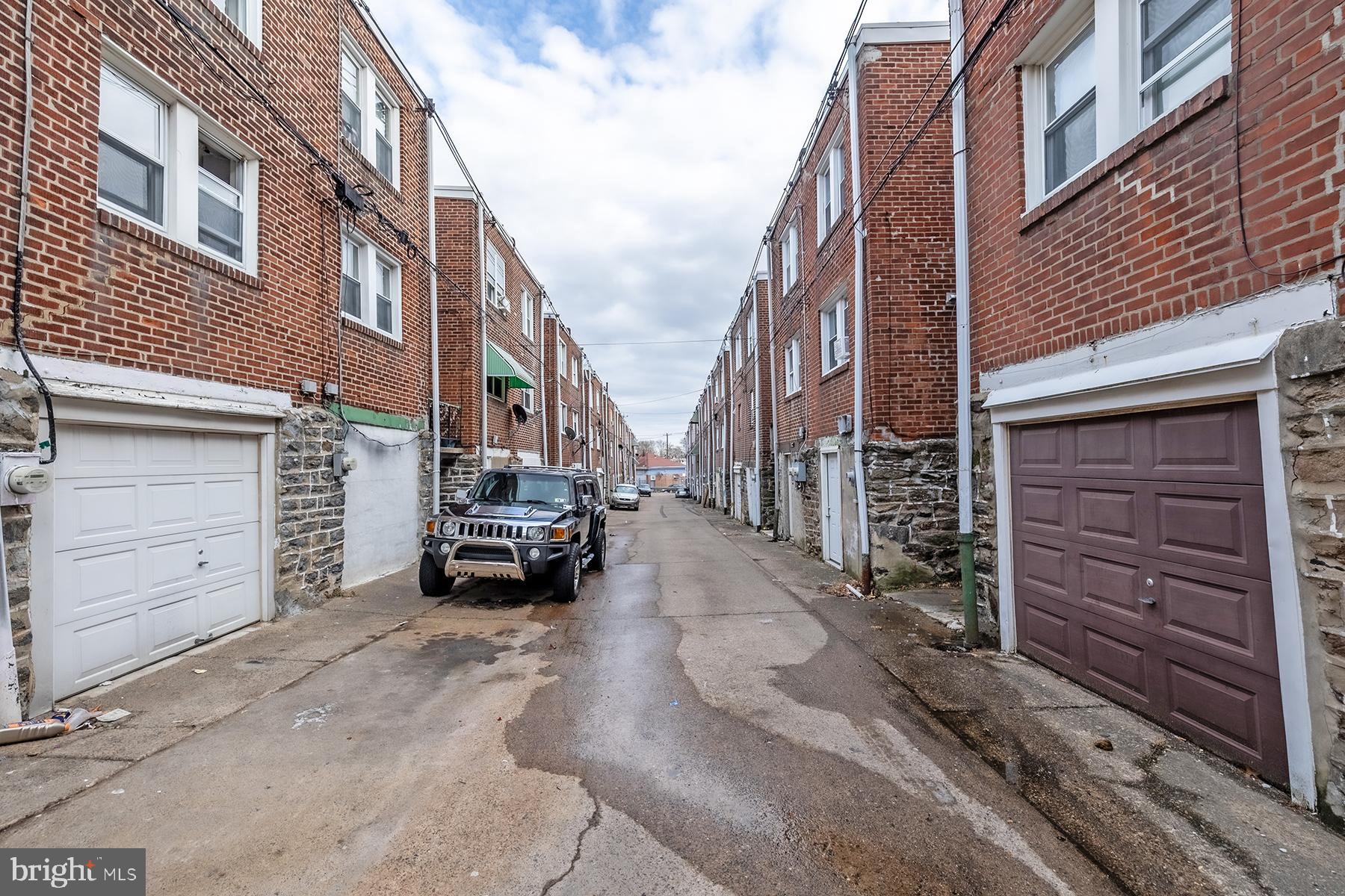 3104 Stirling Street Philadelphia, PA 19149 - Photo 26 of 27 a car parked in front of a building