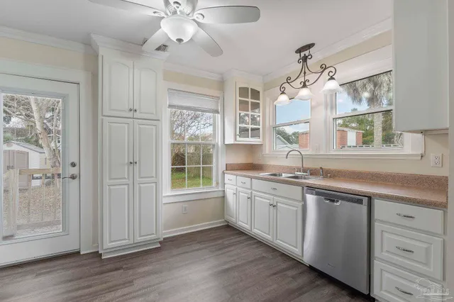 a spacious bathroom with a granite countertop sink mirror and a shower